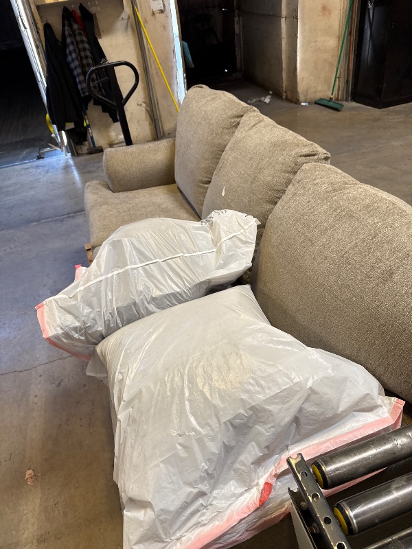 Photo 1 of Signature Design by Ashley Stonemeade Casual Sofa with 4 Toss Pillows, Light Brown