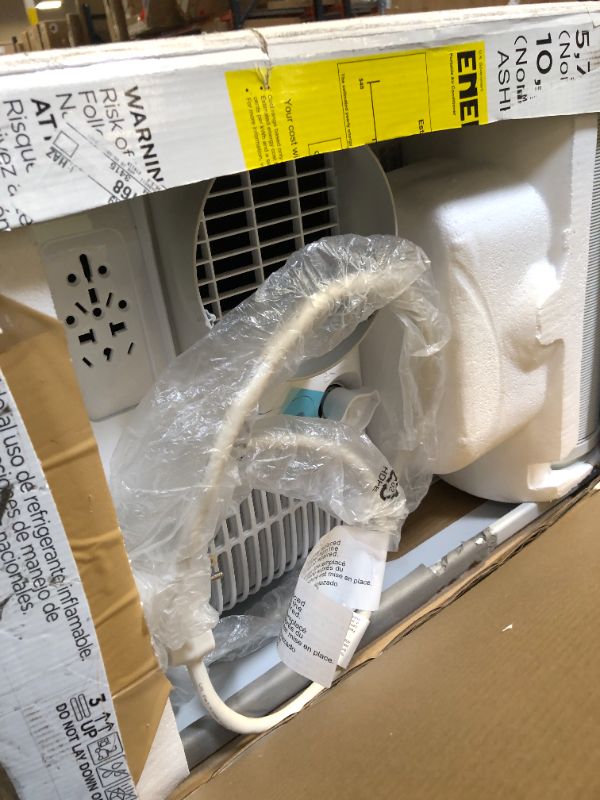 Photo 1 of BLACK+DECKER Portable Air Conditioner, 10,000 BTU (6,300 BTU SACC) for Rooms up to 450 Sq. Ft., Portable AC with Follow Me Remote Control and Window Kit, BPACT10WT, White