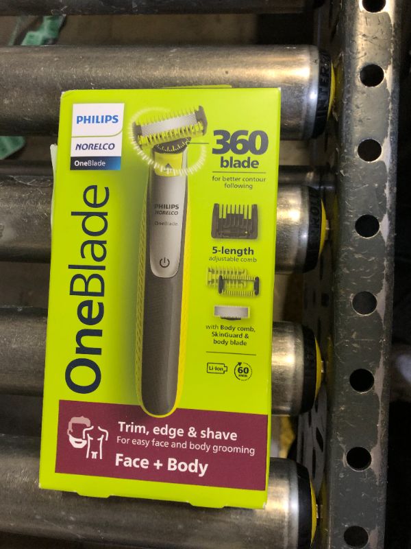Photo 1 of Philips Norelco OneBlade 360 Hybrid Face + Body, Electric Beard Trimmer, Shaver and Body Groomer, with 360 Blade Technology, 1x 360 Blade for Face, 5in1 Adjustable Comb, 1x Body Kit, Model QP2834/70