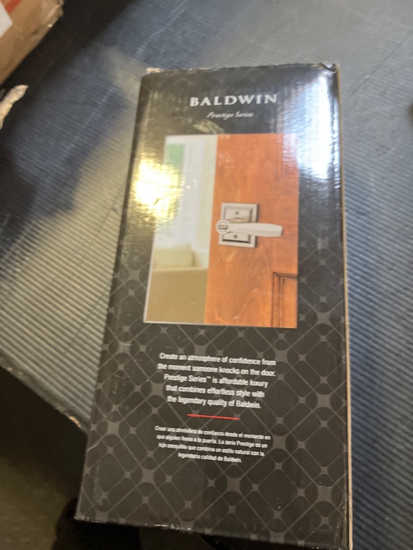 Photo 1 of Baldwin Torrey, Entry Door Handle Reversible Lever with Keyed Lock Featuring SmartKey Re-key Technology and Microban Protection, in Satin Nickel