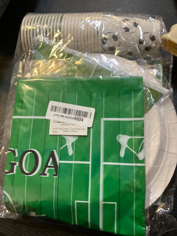 Photo 1 of Soccer Party Decorations 98Pcs Soccer Birthday Party Decorations Suppiles Set Include Dinner Plates, Dessert Plates, Napkins, Cups, Banner and Tablecloth Soccer Theme Party Favors Kit
