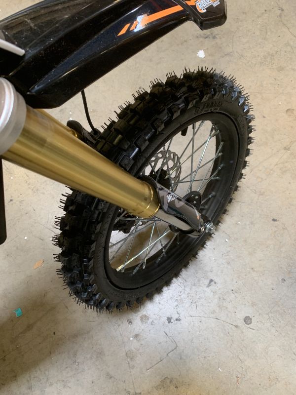 Photo 1 of MotoTec 48v Pro Electric Dirt Bike 1800w Lithium Orange, 58x24x36