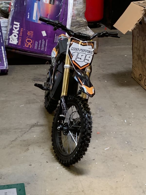 Photo 1 of MotoTec 48v Pro Electric Dirt Bike 1800w Lithium Orange, 58x24x36