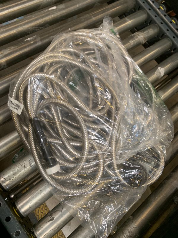 Photo 1 of SPECILITE 50ft 304 Stainless Steel Garden Hose Metal, Heavy Duty Water Pipe with Nozzles for Yard, Outdoor - Flexible, Never Kink & Tangle, Puncture Resistant (Sliver)