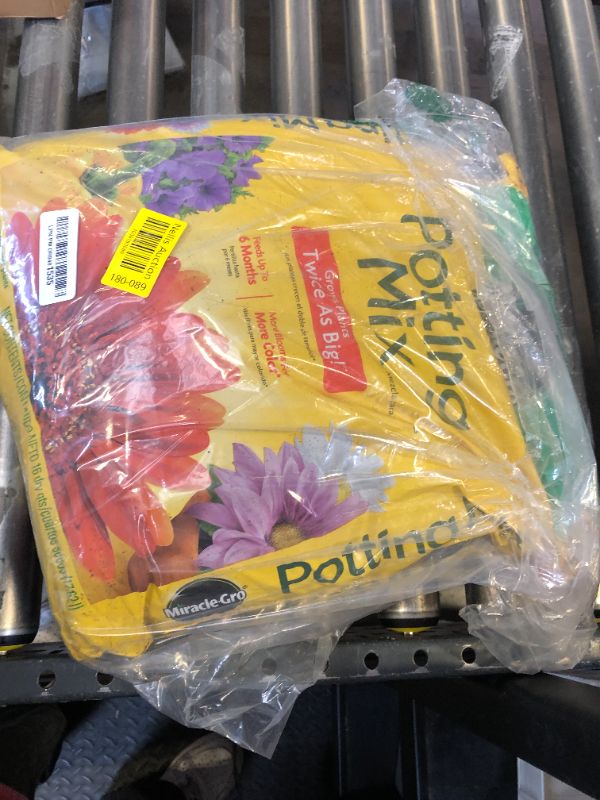 Photo 1 of Miracle-Gro Potting Mix, For Container Plants, Flowers, Vegetables, Shrubs, Annuals, Perennials, Feeds up to 6 Months, 16 qt.