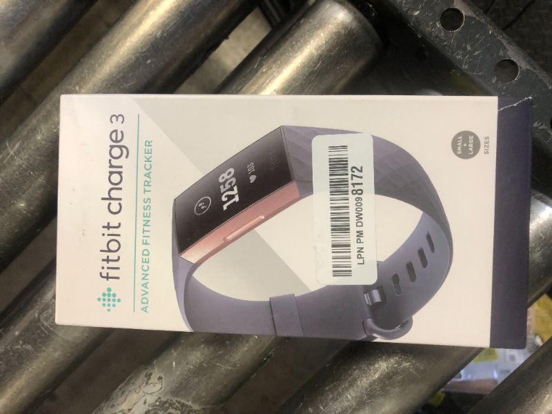 Photo 1 of Fitbit Charge 3 Fitness Activity Tracker, Rose Gold/Blue Grey, One Size (S and L Bands Included)