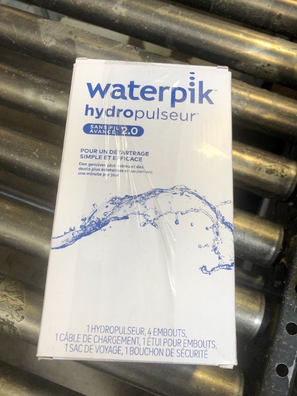 Photo 1 of Waterpik Cordless Advanced 2.0 Water Flosser For Teeth, Gums, Braces, Dental Care With Travel Bag and 4 Tips, ADA Accepted, Rechargeable, Portable, and Waterproof, Blue WP-583, Packaging May Vary