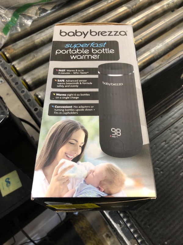 Photo 1 of Baby Brezza Superfast Portable Baby Bottle Warmer – 67% Faster - Travel Breastmilk Warmer and Formula Warmer - Safe, Even Heating - Up to 9oz - No Adapters, Black
