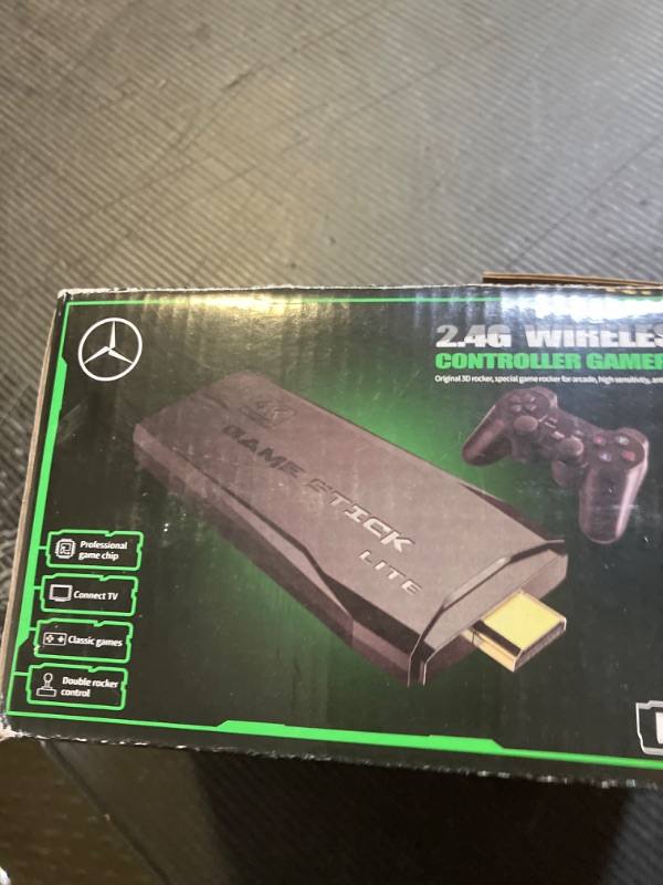 Photo 1 of 4K Wireless Retro Game Console Stick with 20000+ Games, Built-in 9 Emulators, two 2.4G Controllers Plug and Play Video Games for TV
