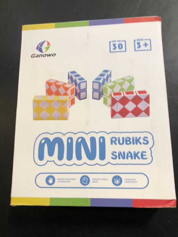 Photo 1 of Ganowo 30 Pack Party favor, Medium Fidget Snake Cube Twist Puzzle Toys for Kids Teens Stocking Stuffers Bulk Birthday Party Supplies Goodie Bags Fillers (Rainbow)