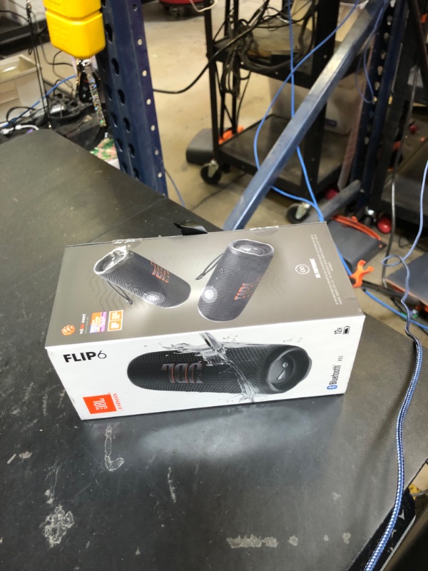 Photo 1 of JBL Flip 6 - Portable Bluetooth Speaker, powerful sound and deep bass, IPX7 waterproof, 12 hours of playtime, JBL PartyBoost for multiple speaker pairing for home, outdoor and travel (Black)