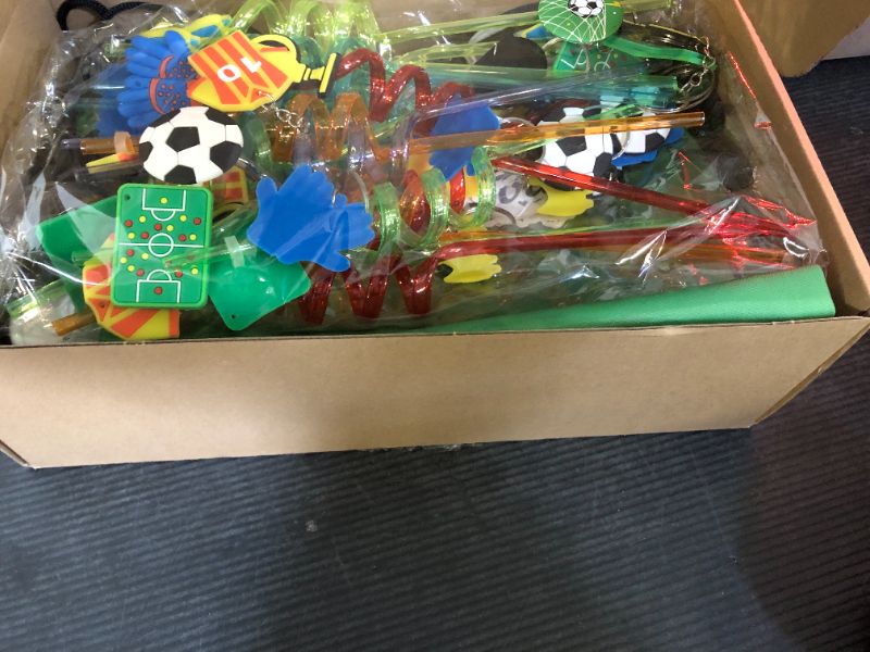 Photo 1 of Sadnyy 140 Pcs Soccer Party Favors Birthday Party Decorations Supplies Drawstring Bags with Silicone Bracelets Keychains Straws Button Pins Stickers for Classroom Rewards Goodie Bags Stuffers