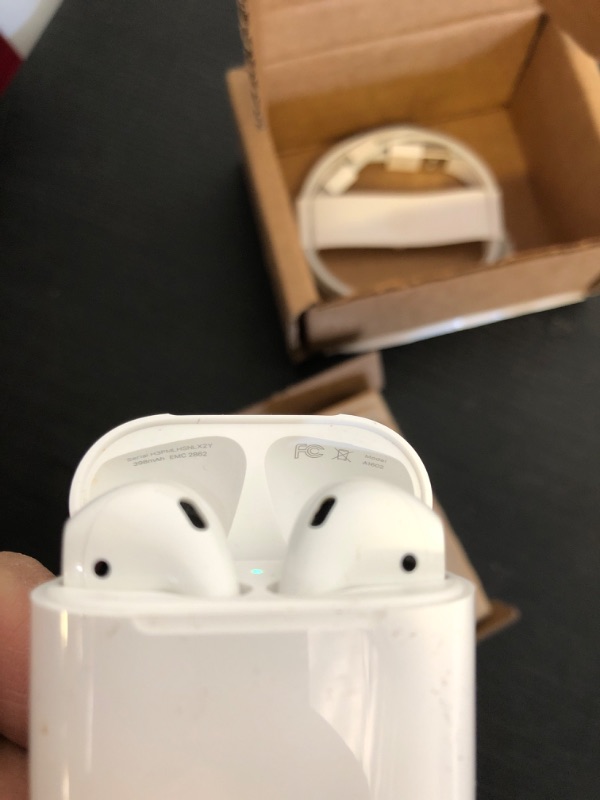 Photo 1 of Apple AirPods 2 with Charging Case - White (Renewed Premium)