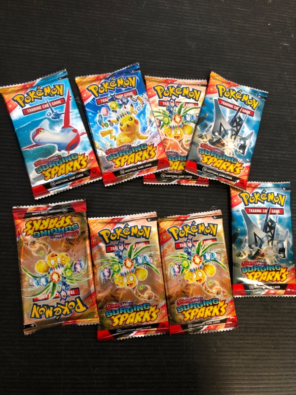 Photo 1 of Generic Surging Sparks Sleeved Eight (8) Booster Packs OPENED
