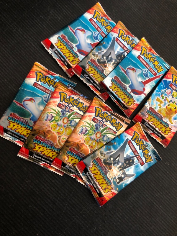 Photo 1 of Generic Surging Sparks Sleeved Eight (8) Booster Packs**OPENED