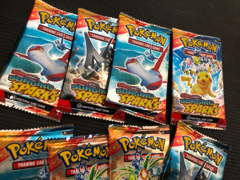 Photo 1 of Generic Surging Sparks Sleeved Eight (8) Booster Packs**OPENED