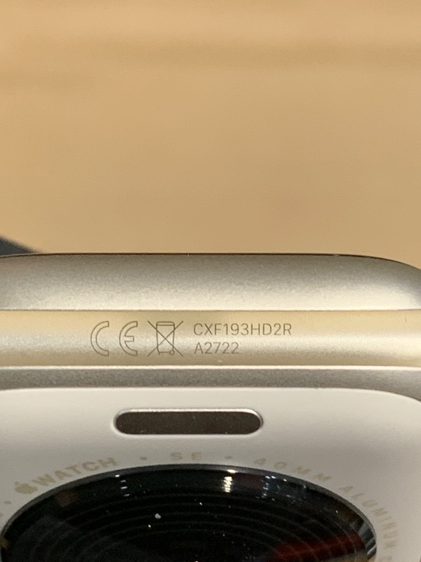 Photo 1 of (USED/FAIR) Apple Watch SE (2nd Gen) [GPS 40mm] Smartwatch with Starlight Aluminum Case with Starlight Sport Band S/M. Fitness and Sleep Trackers, Crash Detection, Heart Rate Monitor, Retina Display