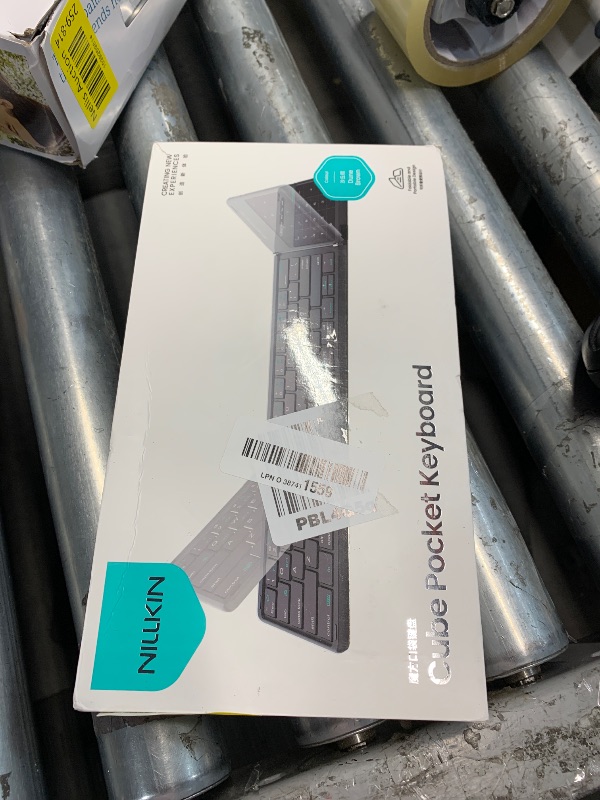 Photo 1 of Nillkin Foldable Keyboard with Touchpad, Bluetooth Keyboard with Number Pad, Full Size Keys, Large Trackpad Small Travel Portable Keyboards for iPad Laptop PC Tablets -Khaki