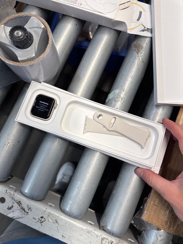Photo 1 of (CONNECTED TO PREVIOUS OWNER) (PARTS) Apple Watch SE (2nd Gen) [GPS 40mm] Smartwatch with Starlight Aluminum Case with Starlight Sport Band S/M. Fitness and Sleep Trackers, Crash Detection, Heart Rate Monitor, Retina Display