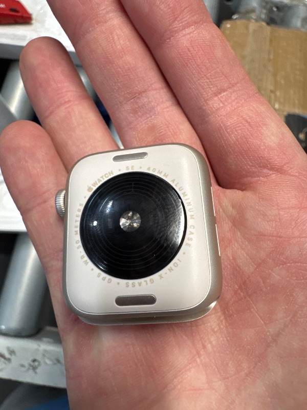 Photo 1 of (CONNECTED TO PREVIOUS OWNER) (PARTS) Apple Watch SE (2nd Gen) [GPS 40mm] Smartwatch with Starlight Aluminum Case with Starlight Sport Band S/M. Fitness and Sleep Trackers, Crash Detection, Heart Rate Monitor, Retina Display