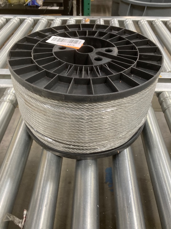 Photo 1 of 1/4" Stainless Steel Cable,7x19 Strand Aircraft Wire Rope,Cable for Heavy Duty Applications,Zip Iine and Outdoor Pulley Cables,Deck Railing, with Gloves,Breaking Strength 6400 Ibs,600FT