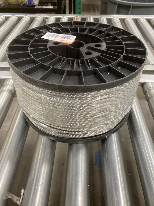 Photo 1 of 1/4" Stainless Steel Cable,7x19 Strand Aircraft Wire Rope,Cable for Heavy Duty Applications,Zip Iine and Outdoor Pulley Cables,Deck Railing, with Gloves,Breaking Strength 6400 Ibs,600FT