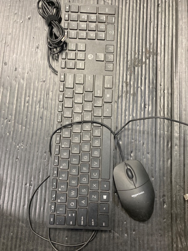 Photo 1 of Amazon Basics Wired Keyboard and Mouse Bundle, Full-Sized, QWERTY Layout, Black