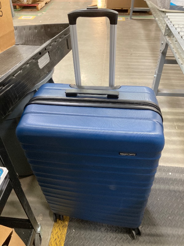Photo 1 of Amazon Basics 26 in Hardside Medium Checked Luggage, Hardshell Suitcase With Wheels, Expandable For Up to 15% More Space, With Scratch-Resistant Surface, Four Multi-directional Wheels, Navy Blue
