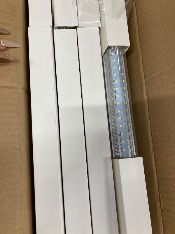 Photo 1 of (Pack of 12) 6FT LED Tube Light T8 Integrated Single Fixture for Utility Shop, 60W, 6000K, Daylight White 8000lm High Output, Linkable LED Ceiling Light for Garage, Basement, Clear Lens