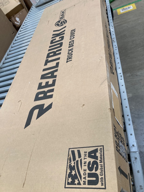 Photo 1 of *see notes*
RealTruck BAK BAKFlip MX4 Hard Folding Truck Bed Tonneau Cover | 448426 | Fits 2016-2023 Toyota Tacoma w/OE Track System 5' 1" Bed (60.5")