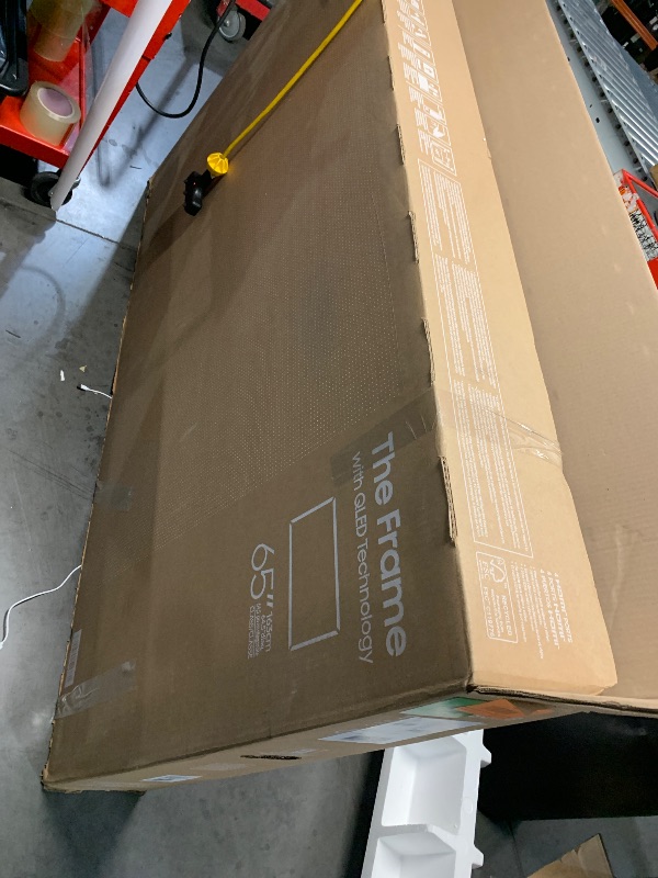 Photo 1 of Samsung 65-Inch Class QLED 4K LS03D The Frame Series Quantum HDR Smart TV w/Dolby Atmos, Art Mode, Anti-Reflection, Customizable Frame, Slim Fit Wall Mount with Alexa Built-in (QN65LS03D, 2024 Model)