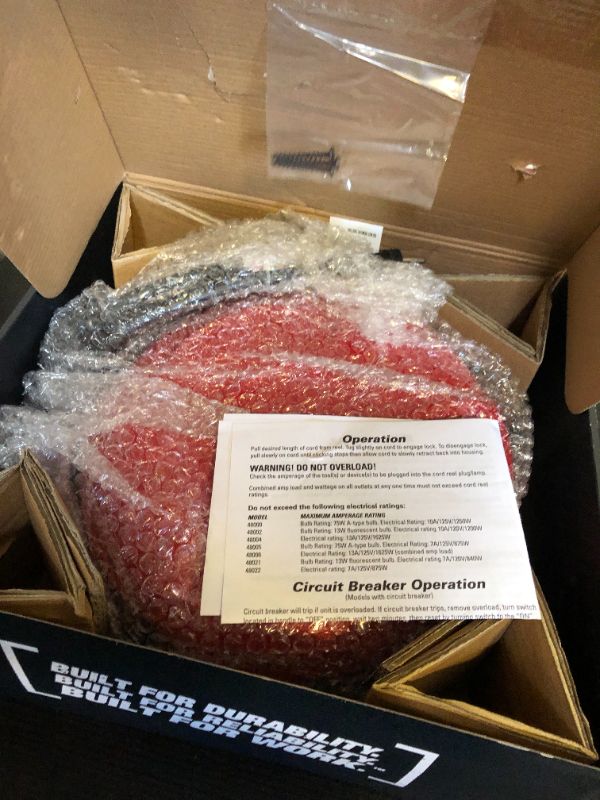 Photo 1 of Woods Medium Duty Extension Cord Reel with Locking Plug, 30Ft, 14 Gauge, 3 Conductor, Metal Reel, Red, 48004