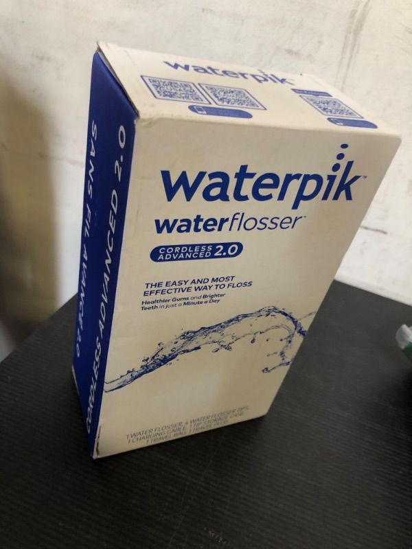 Photo 1 of Waterpik Cordless Advanced 2.0 Water Flosser For Teeth, Gums, Braces, Dental Care With Travel Bag and 4 Tips, ADA Accepted, Rechargeable, Portable, and Waterproof, White WP-580, Packaging May Vary