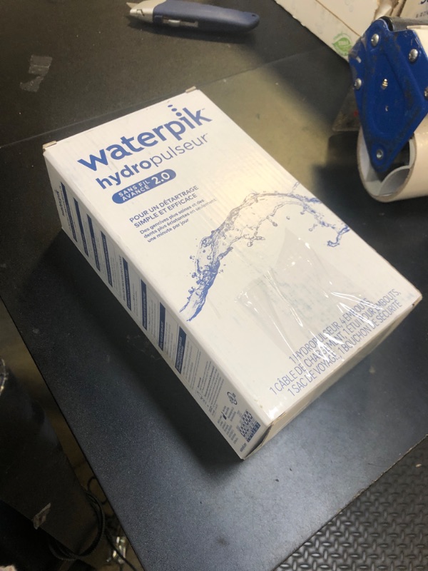 Photo 1 of Waterpik Cordless Advanced 2.0 Water Flosser For Teeth, Gums, Braces, Dental Care With Travel Bag and 4 Tips, ADA Accepted, Rechargeable, Portable, and Waterproof, Gray WP-587, Packaging May Vary