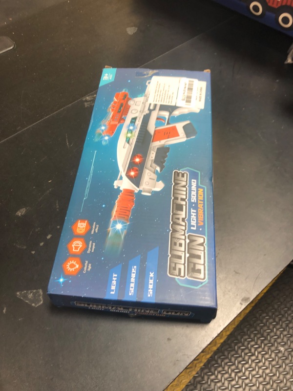 Photo 1 of Tcxomino Light Up Toy Gun with Sound Effects for Kids, Unique Shaking Planes & Barrel Telescopic Action, Baby Toy Guns Make Noise, Christmas Birthday Gifts for Boys Girls (Batteries Not Included)