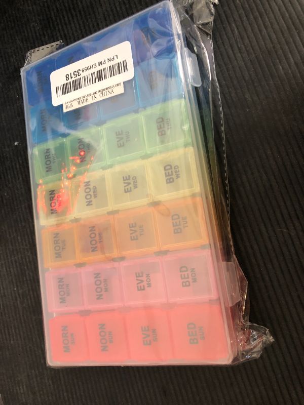 Photo 1 of ZVZM Weekly Pill Organizer 4 Times a Day, Medicine Organizer Box, Travel Daily Pill Box Organizer 7 Day, Pill Case, Pill Container Holder for Hold Vitamins/Fish Oils.