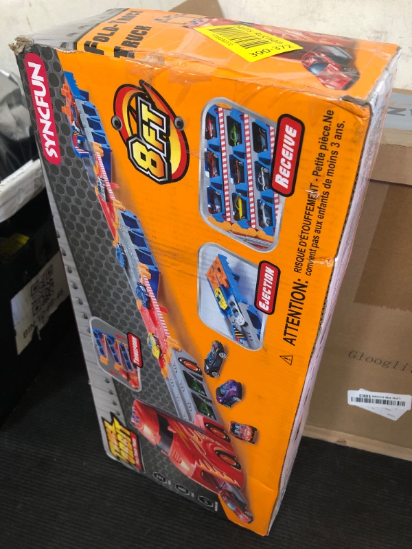 Photo 1 of SYNCFUN Carrier Truck Race Track Toddler Toy - 8-FT Foldable 3 Layer Toy Truck with 12 Die-Cast Metal Racing Cars and Lights & Sounds Gift for 3 4 5 Years Old Boys and Girls-Blue