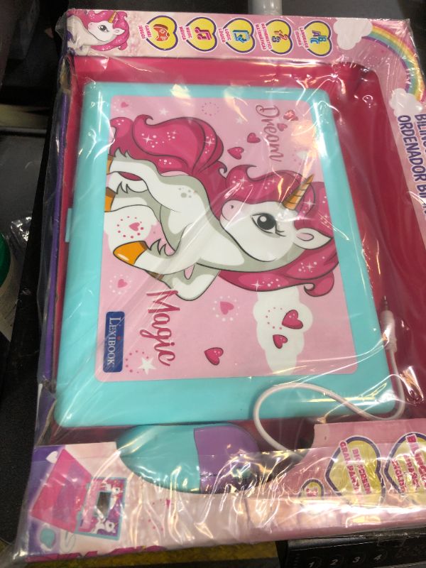 Photo 1 of LEXiBOOK - Unicorn Educational and Bilingual Laptop Spanish/English - Toy for Children with 124 Activities to Learn Mathematics, Dactylography, Logic, Clock Reading, Play Games and Music - JC598UNIi2