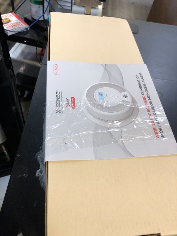 Photo 1 of X-Sense Wireless Interconnected Combination Smoke and Carbon Monoxide Detector with LCD Display & 10-Year Battery, Over 820 ft Transmission Range, 6-Pack