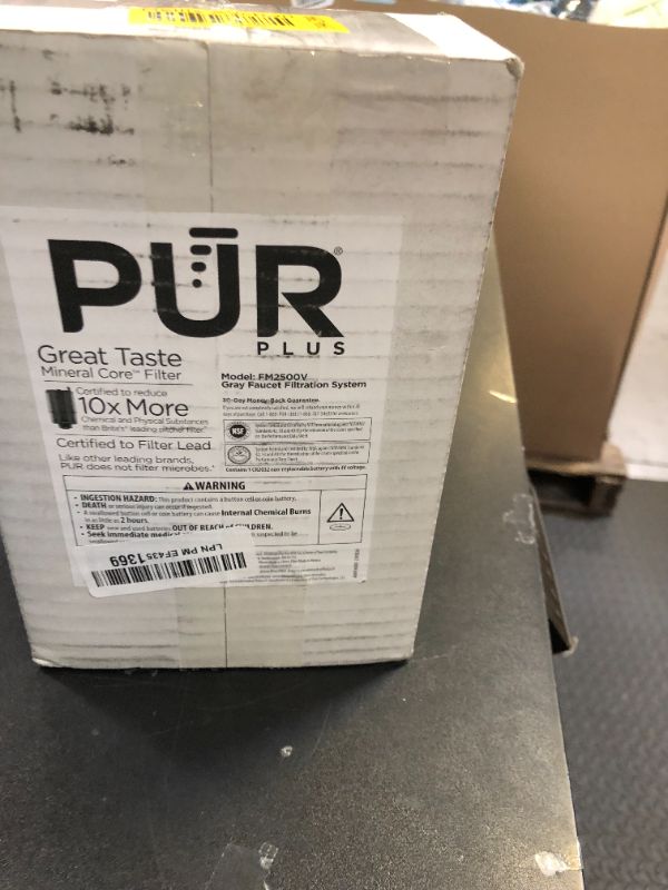 Photo 1 of PUR PLUS Vertical Faucet Mount Water Filtration System, Lead-Reducing Filter, Great-Tasting Water, Easy Install, Lasts 100 Gallons, Compatible with Sinks with External Aerators, Grey