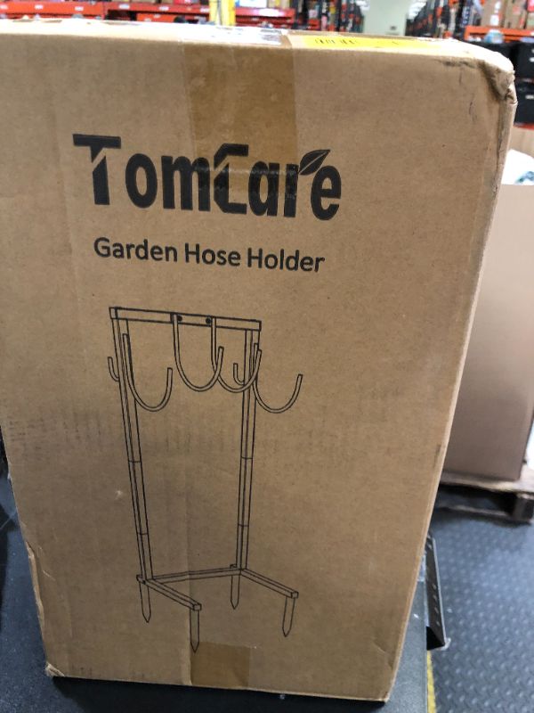 Photo 1 of TomCare Garden Hose Holder Water Hose Holder with 4 Spikes Freestanding Garden Hose Storage Stand Sturdy Hose Hanger Heavy Duty 6 Hooks Hose Organizer for Outside, Black
