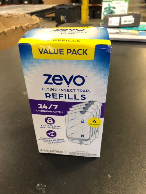Photo 1 of Zevo Flying Insect Trap Refill - for The Zevo MAX & Standard Indoor Fly Trap - Catch Gnats, House & Fruit Flies - Easy to Use - Mess-Free Disposal (4 Refill Cartridges)
