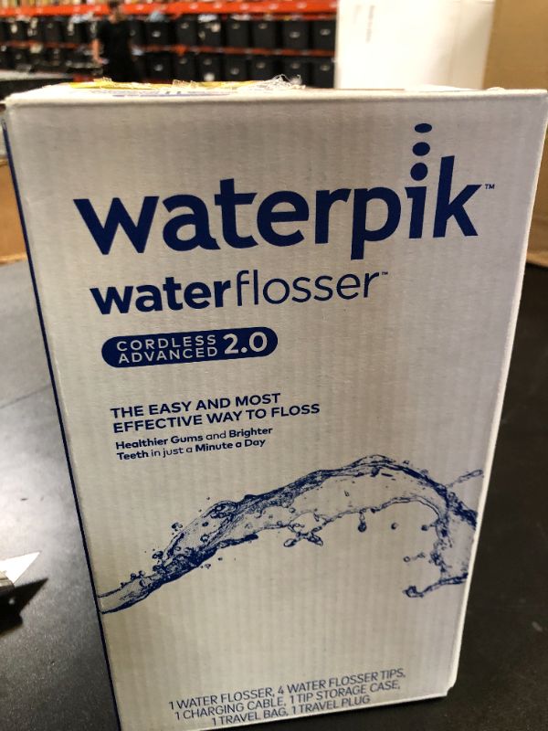 Photo 1 of Waterpik Cordless Advanced 2.0 Water Flosser For Teeth, Gums, Braces, Dental Care With Travel Bag and 4 Tips, ADA Accepted, Rechargeable, Portable, and Waterproof, White WP-580, Packaging May Vary