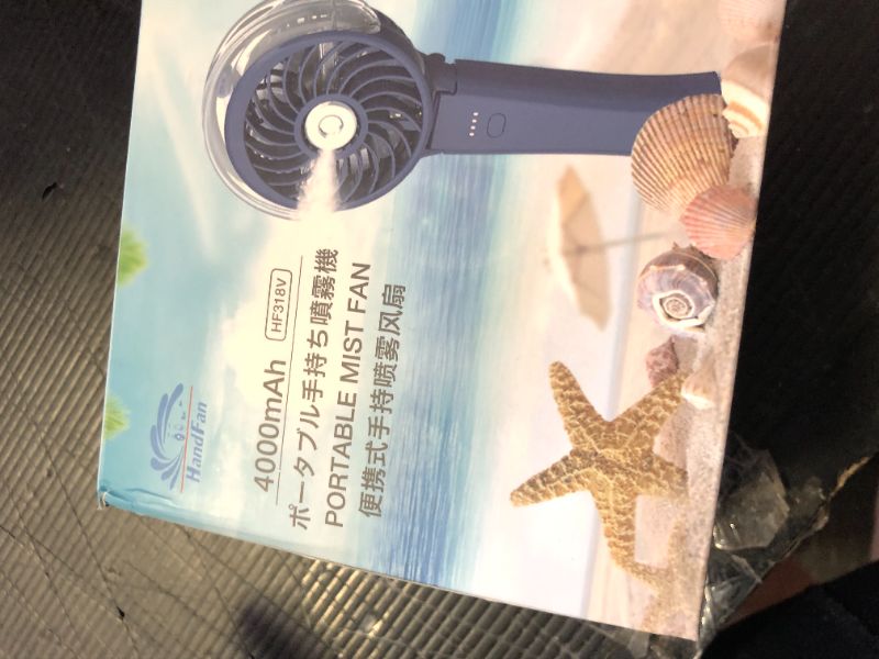 Photo 1 of HandFan Portable Mist Fan 4000mAh with Charger, Rechargeable Personal Fan, Battery Operated Handheld Fan, Foldable Electric Fan for Beach, Travel, Outdoor (Royal Blue)