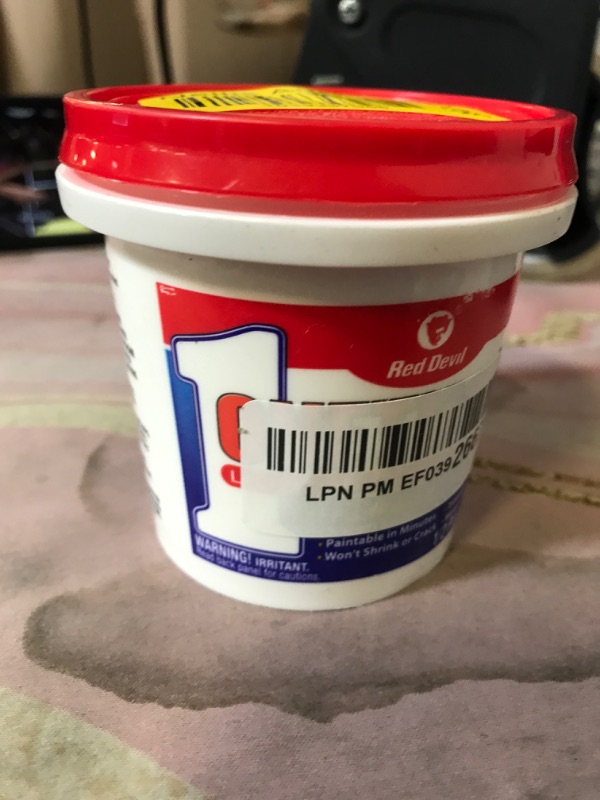 Photo 1 of Red Devil 0542 ONETIME Lightweight Spackle Wall Repair, Spackling for Holes Drywall, 1/2 Pint, White, 8 Ounce, Made in USA