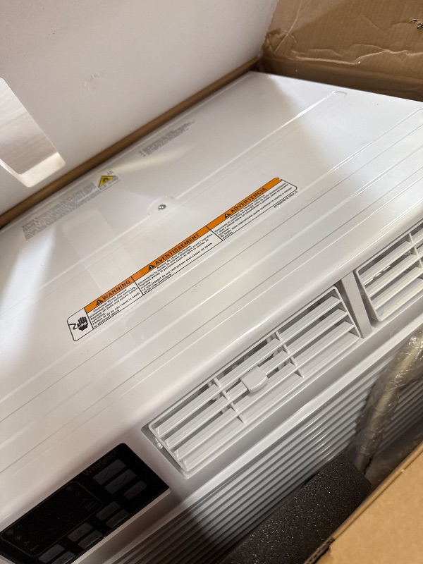 Photo 1 of Whirlpool WHAT081-1BW 8,000 Wall Air Conditioner, 115V, Cools up to 350 Sq. Ft. for Living Room, Bedroom, Kitchen with Dehumidifier and Remote Control, 8000 BTU, Bright White