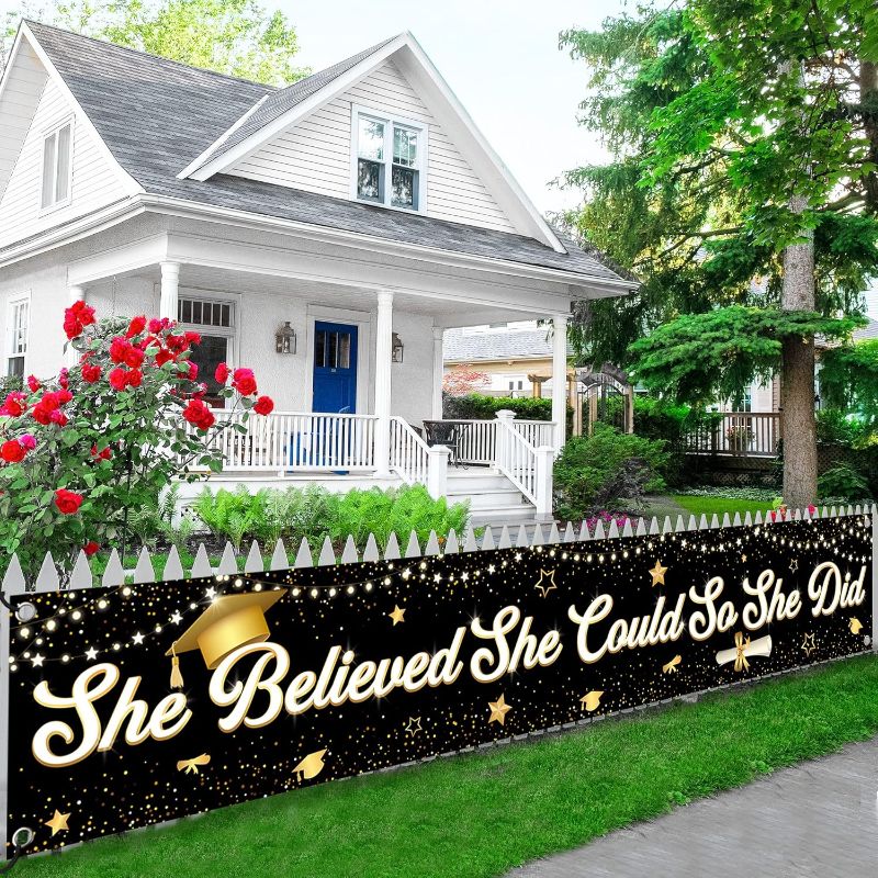 Photo 1 of KatchOn, XtraLarge Black and Gold Graduation Yard Banner - 120x20 Inch | She Believed She Could So She Did Banner | Graduation Decorations 2025