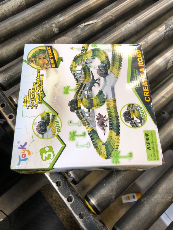 Photo 1 of Dinosaur Toys, 252 PCS Create A Dinosaur World Road Race Tracks, Flexible Track Playset, 2pcs Dinosaur Car for 3 4 5 6 Year Old Boys Girls Birthday Party Favor Gift