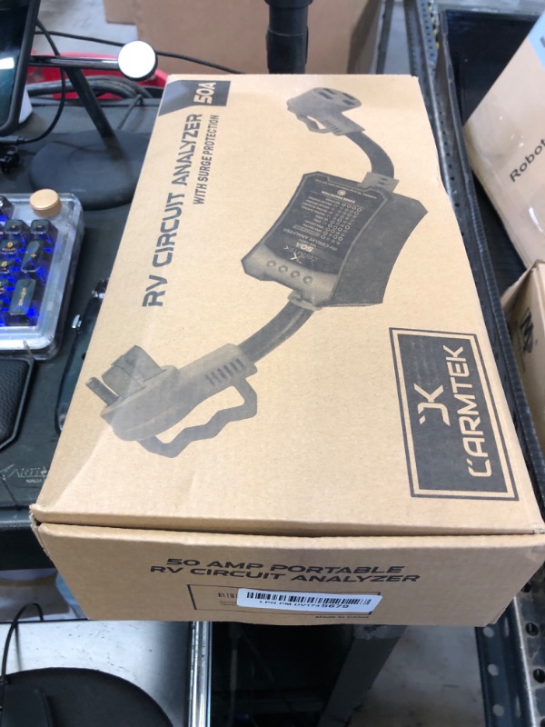 Photo 1 of CARMTEK RV Surge Protector 50 Amp - RV Circuit Analyzer with Integrated Surge Protection - Smart 50 Amp Surge Voltage Defender with Grip Handles
