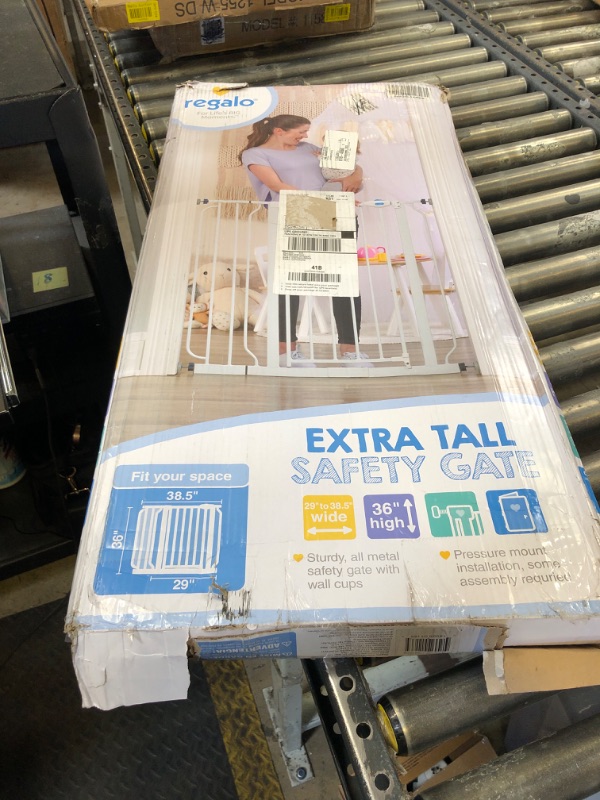 Photo 1 of Regalo Easy Step 36" Extra Tall Walk Thru Baby Gate, Includes 4-Inch Extension Kit, 4 Pack of Pressure Mount Kit and 4 Pack Wall Cups and Mounting Kit, White